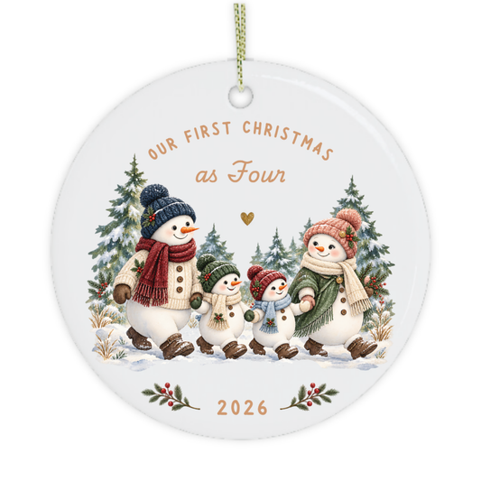 Snowman family of four Christmas ornament with festive winter details.
