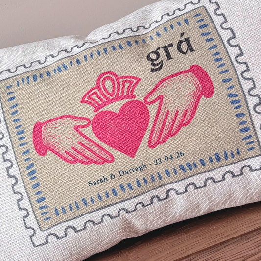 Personalised  modern Irish Claddagh cushion with grá and custom names and date