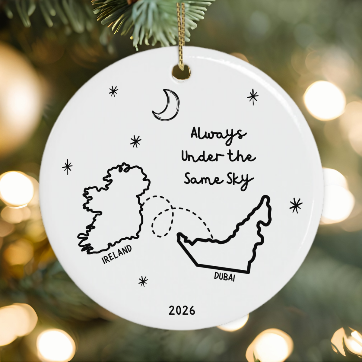 Always Under the Same Sky Ireland to Dubai Christmas ornament with moon and stars