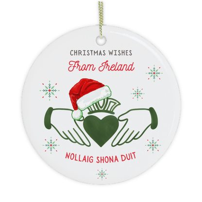 Christmas Wishes from Ireland ornament featuring a green Claddagh, Santa hat and Nollaig Shona Duit greeting