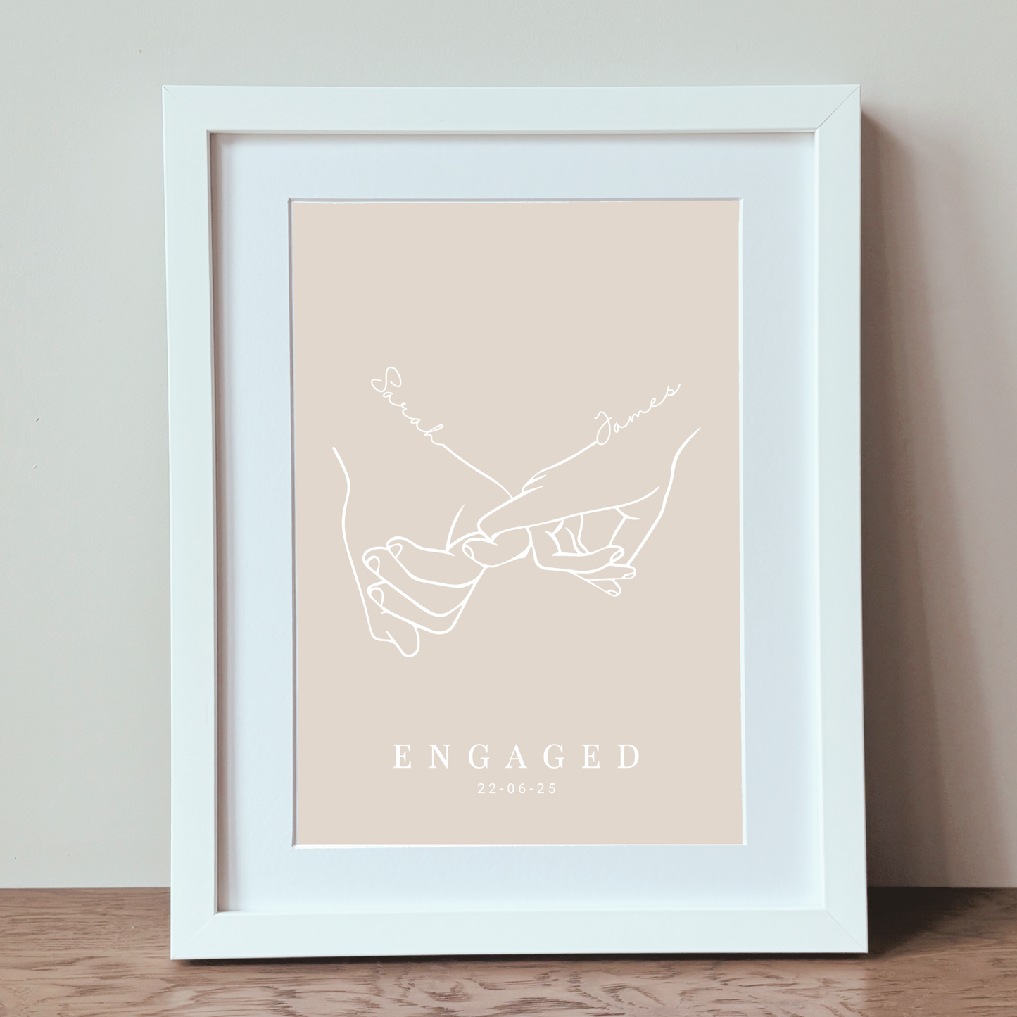 White framed engaged couple line art print with custom names and date
