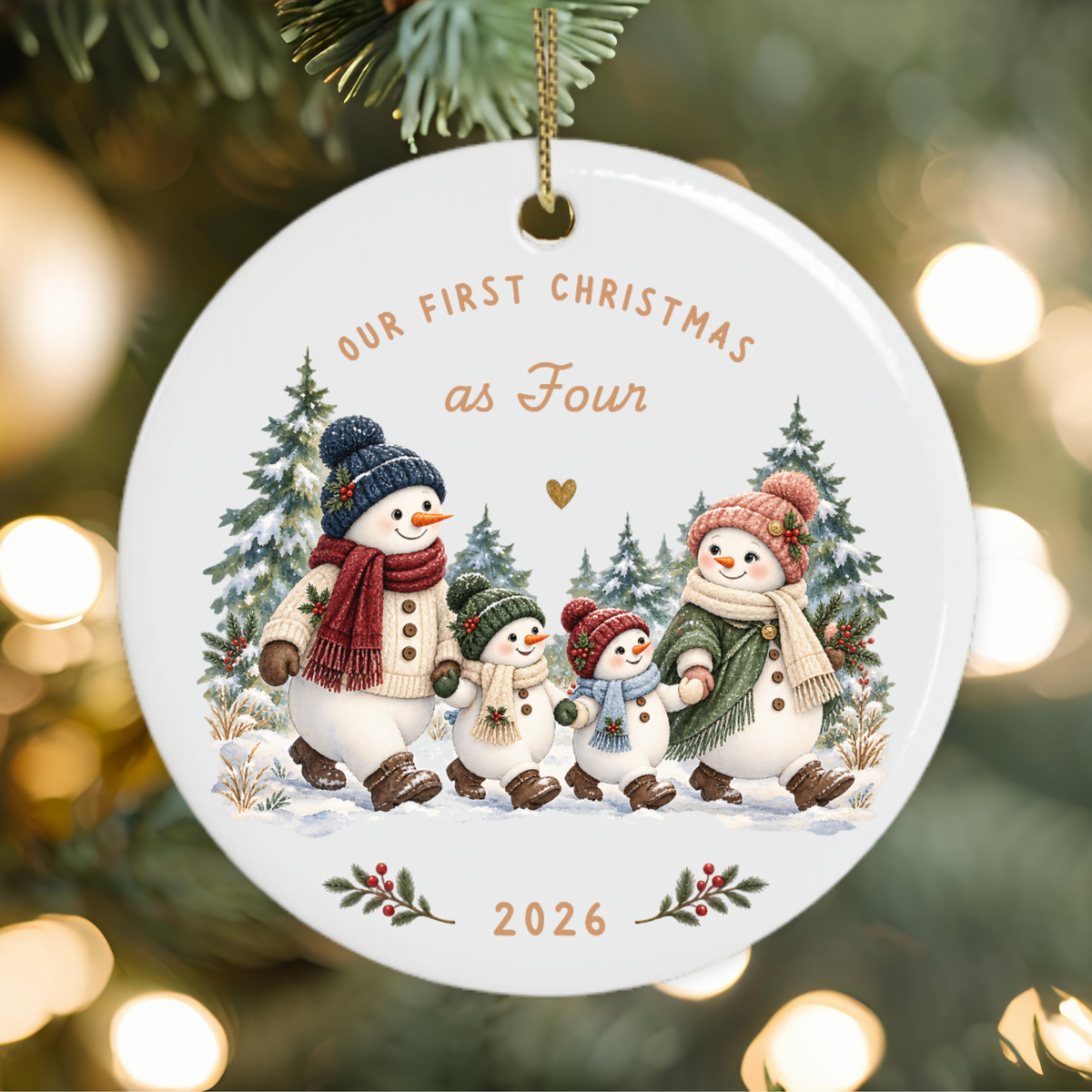 First Christmas as a family of four Christmas ornament featuring a festive snowman family.
