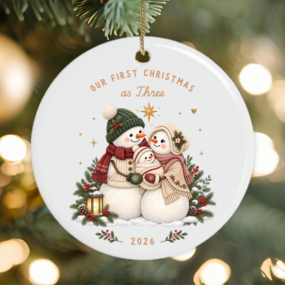 First Christmas as a family of three Christmas ornament featuring a festive snowman family.