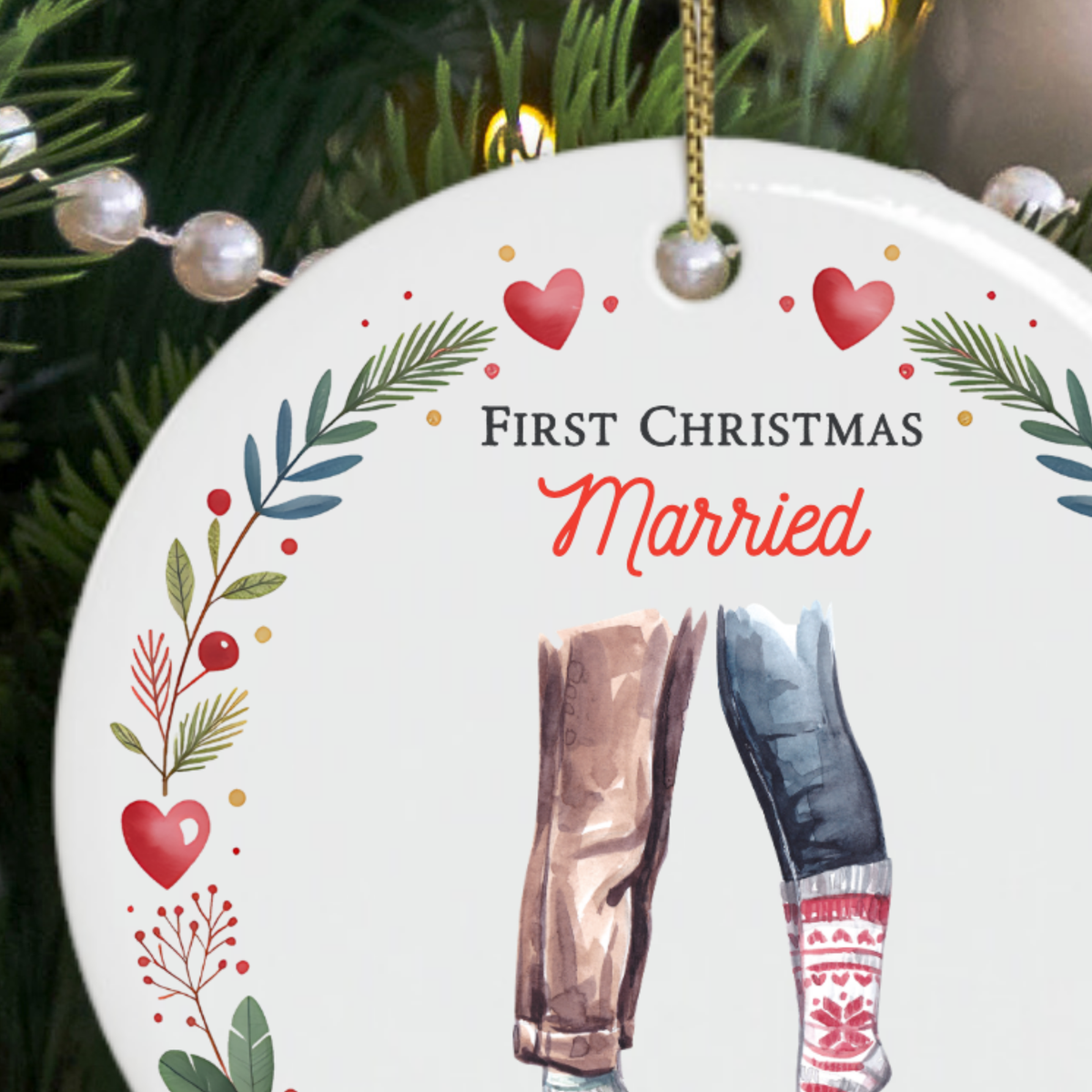 Close-up of the First Christmas Married ornament lettering and festive watercolour illustration