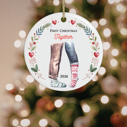 First Christmas Together 2026 ornament hanging on a decorated Christmas tree