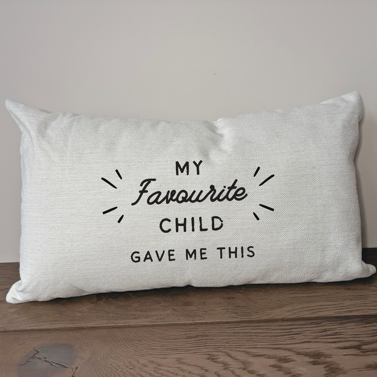 Funny gift for Mum or Dad featuring a “My Favourite Child Bought Me This” cushion