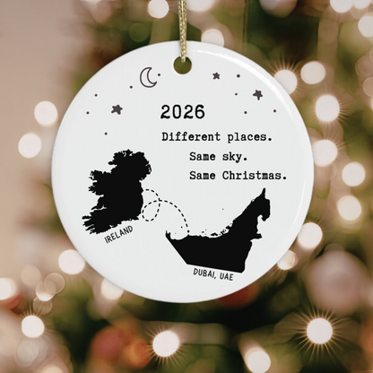Ireland to Dubai Christmas ornament with map silhouettes and “Different Places Same Sky Same Christmas”