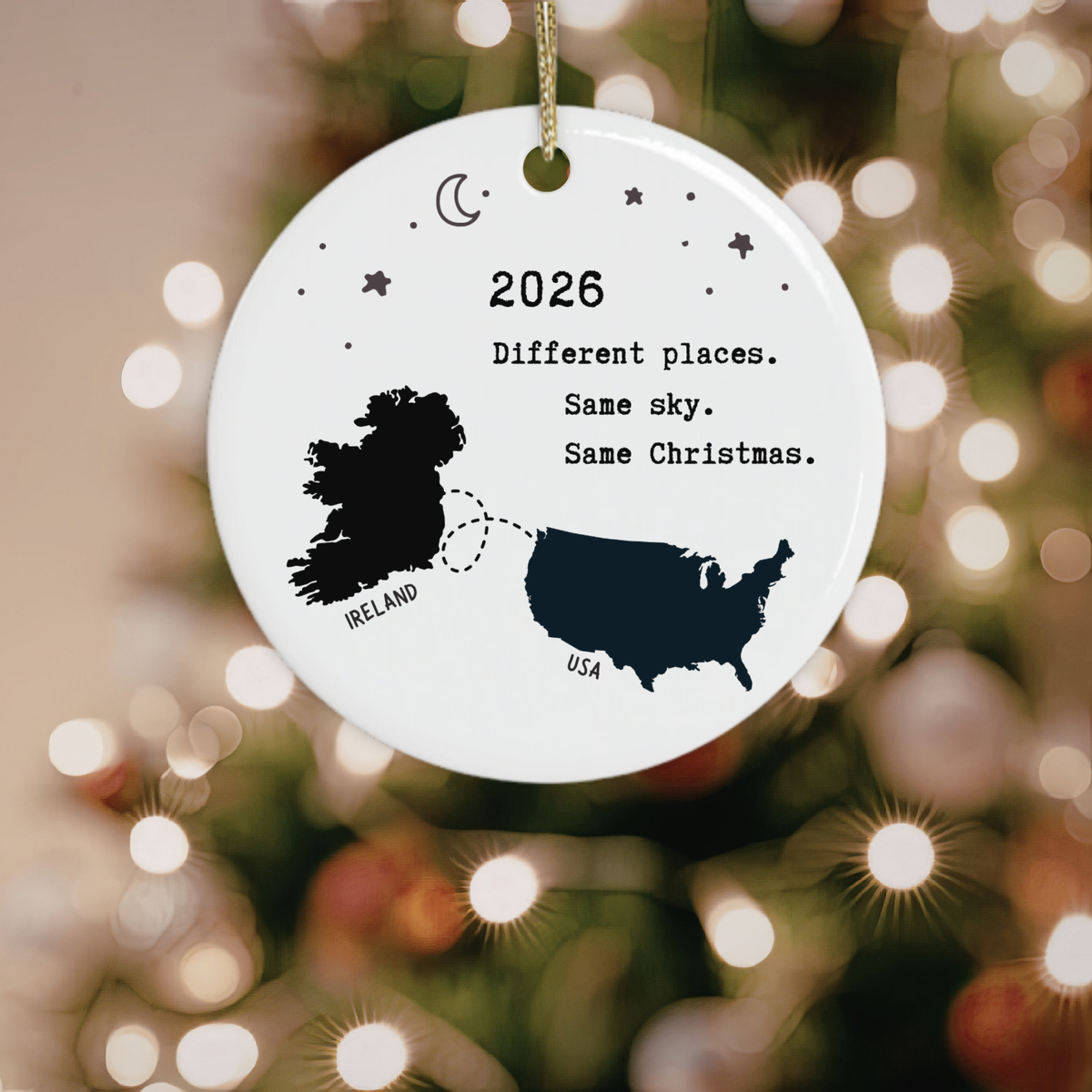 Ireland to USA Christmas ornament with map silhouettes and “Different Places Same Sky Same Christmas”