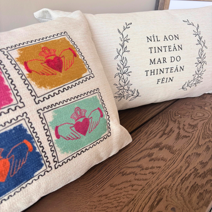 Irish language cushion featuring traditional Irish saying there's no place like home