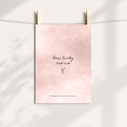 Personalised blush pink How Lucky Are We wall art styled in a home interior